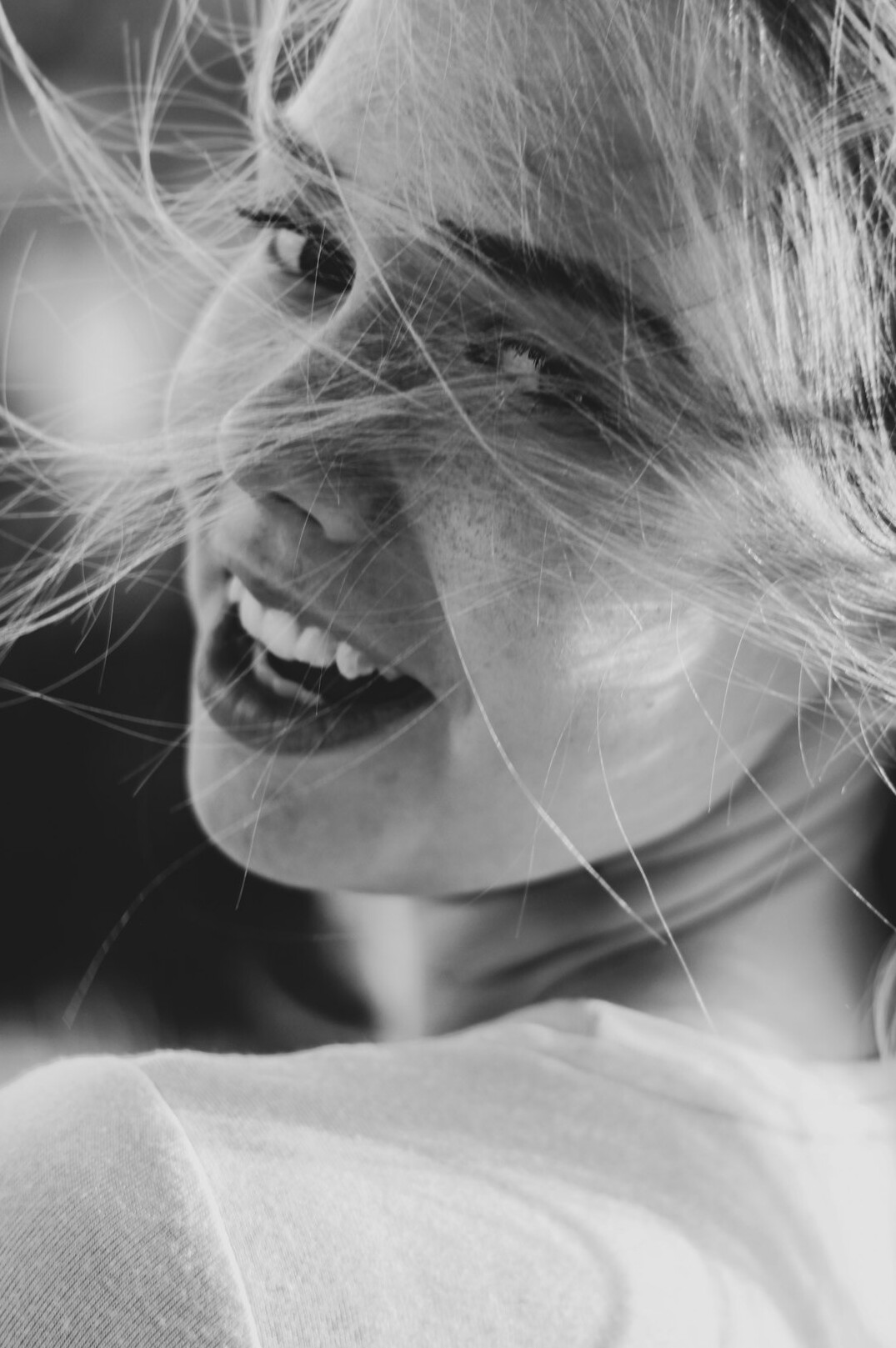 Portrait of a smiling woman with light hair